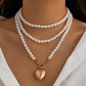 Elegant Gold and White Pearl Necklace